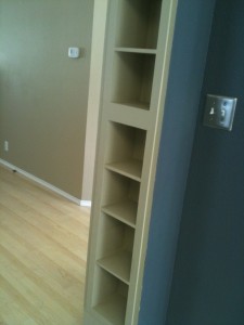 Cubbies my husband installed in columns leading into the kitchen